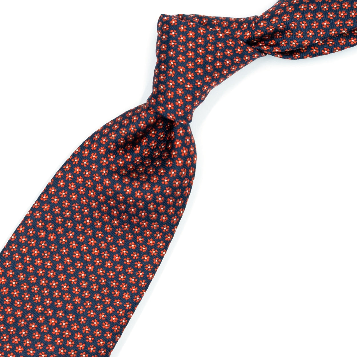 Cravatta blu con fiorellini rossi
