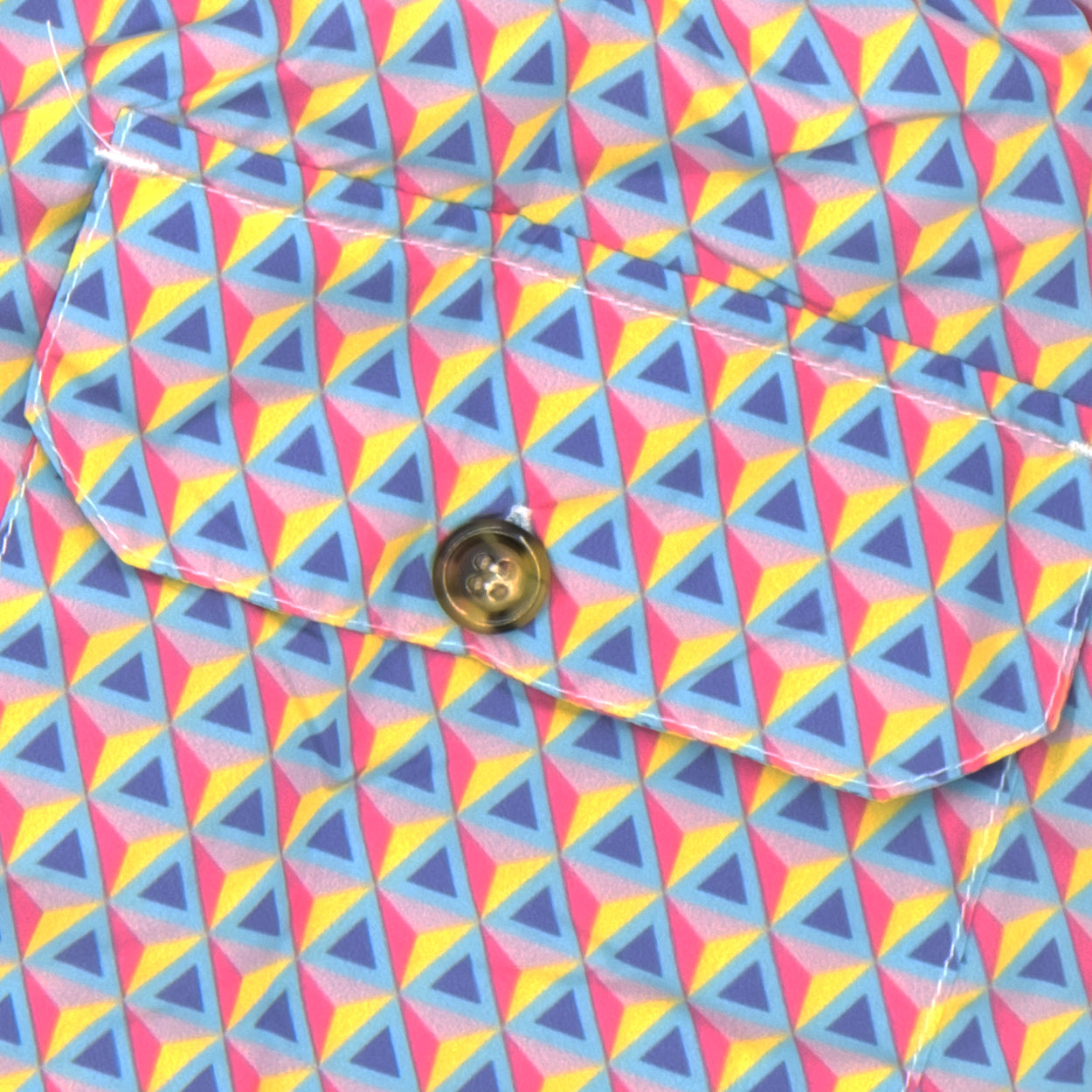 Costume con pattern prisma rosa, fuxia, viola, azzurro e giallo