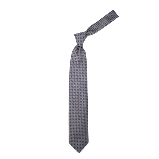 Cravatta grigia con rombi e cerchi blu e puntini azzurri