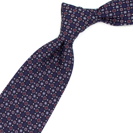 Cravatta blu con pattern rosso, bianco e blu