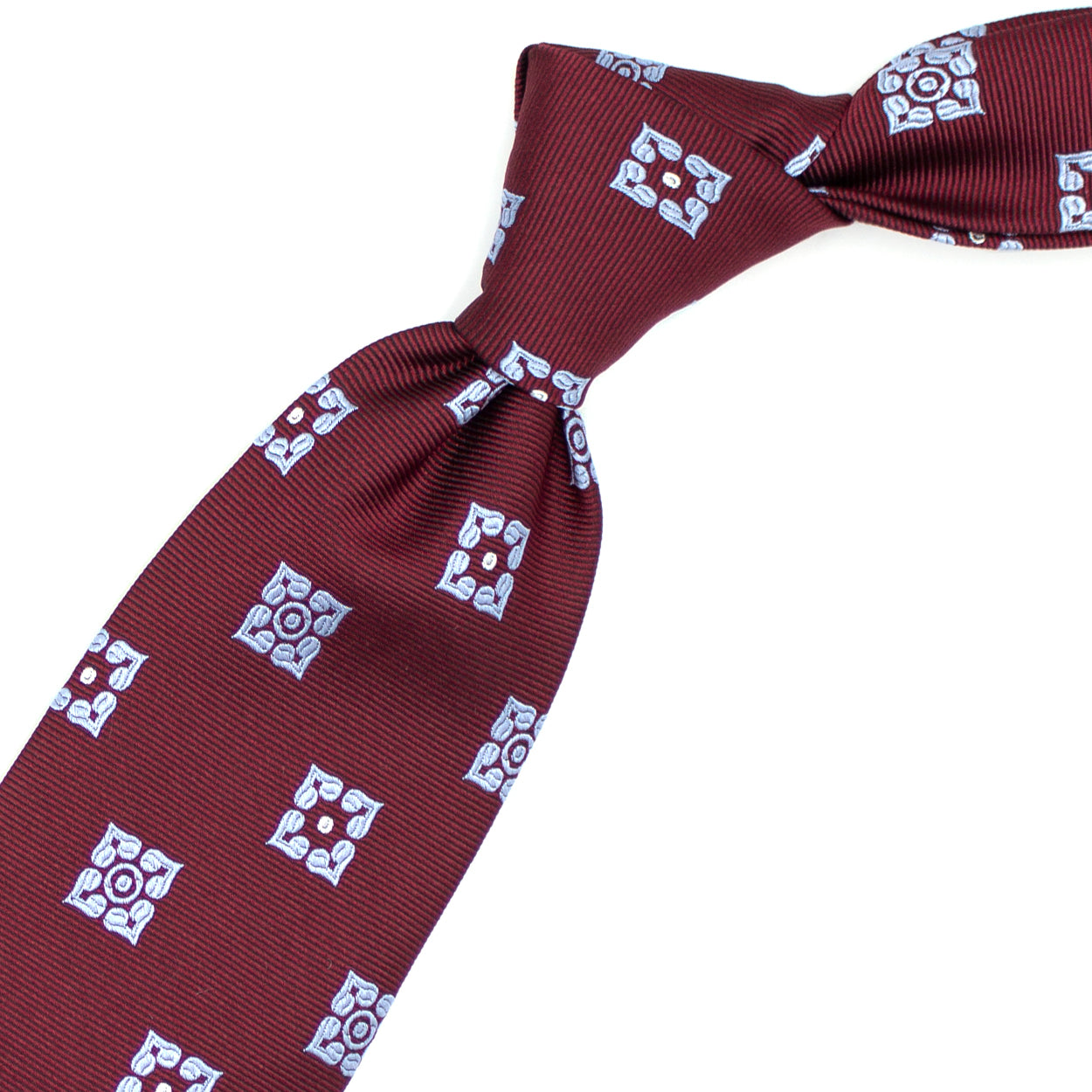 Cravatta bordeaux con fiori azzurri