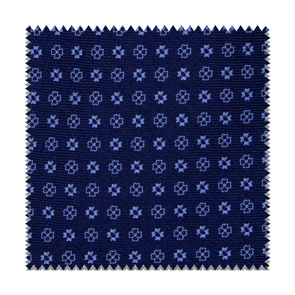 Tessuto blu con fiorellini azzurri