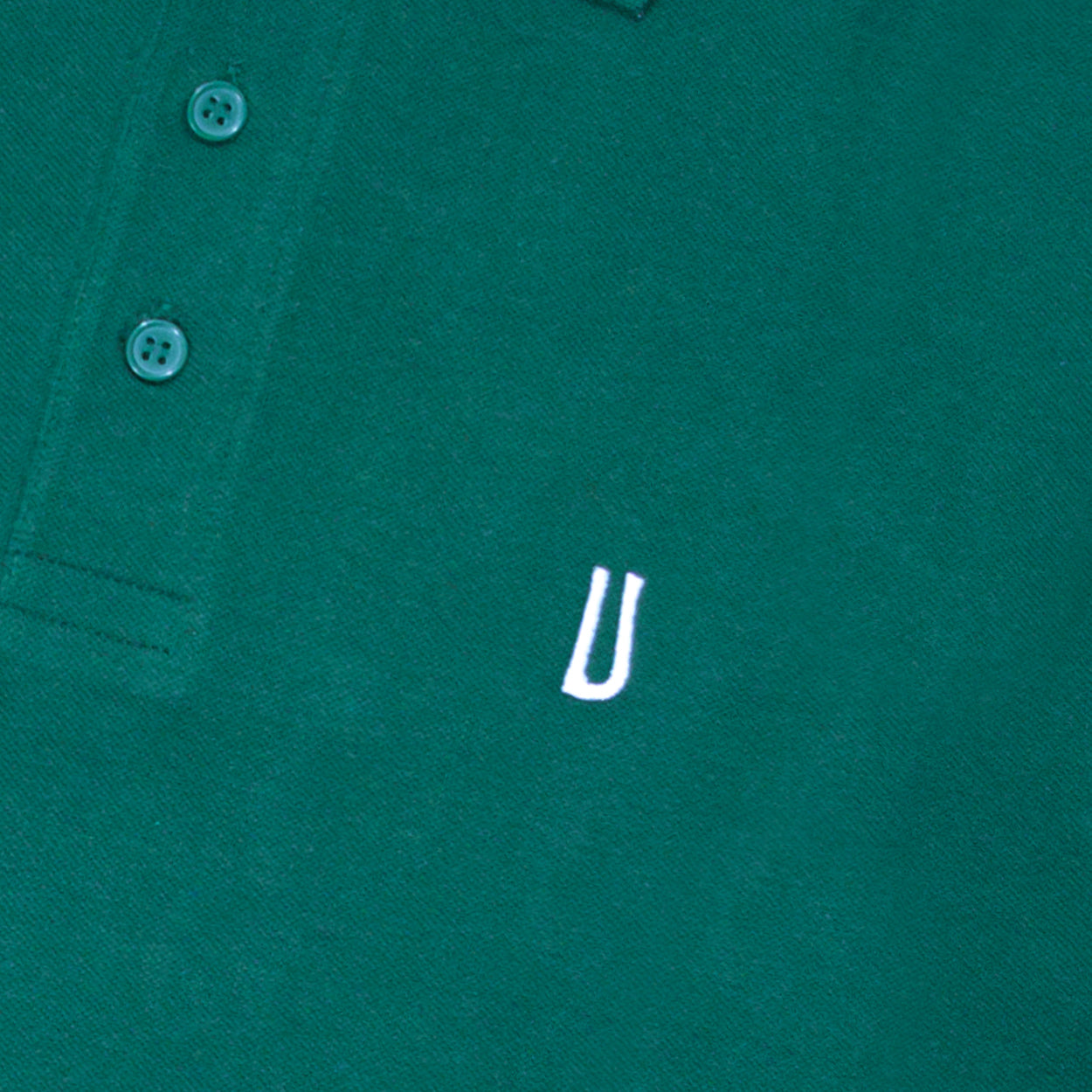 Polo verde con logo Ulturale bianco