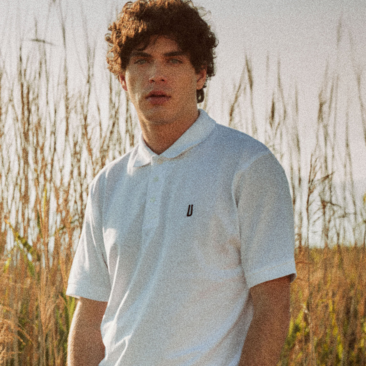 Polo bianca con logo Ulturale blu