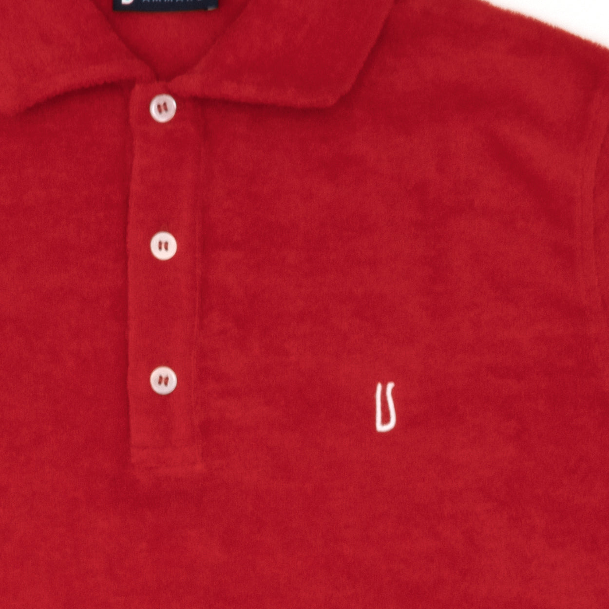 Polo in spugna rossa con logo Ulturale bianco