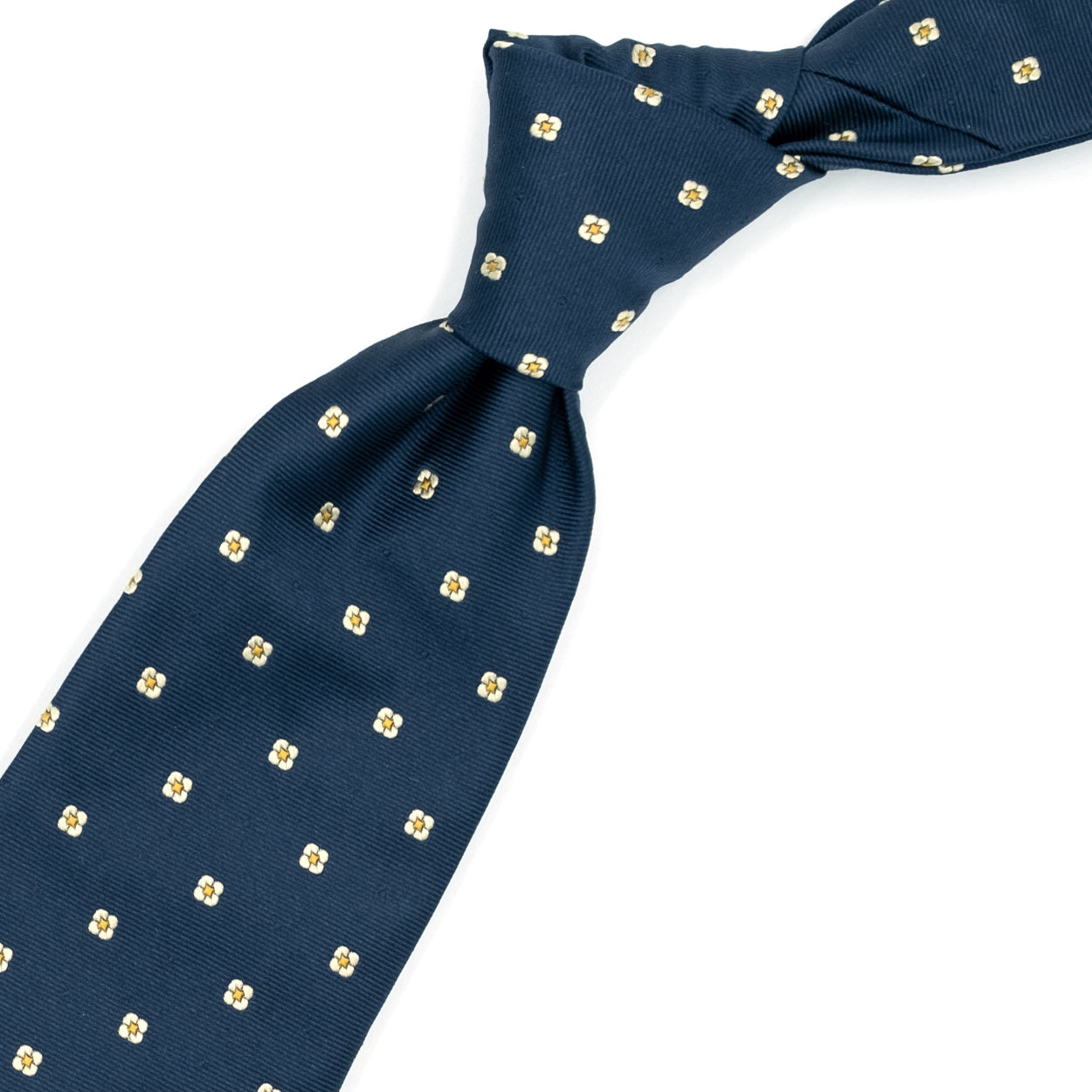 Cravatta blu con fiorellini grigi e puntini gialli