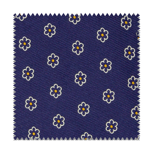 Tessuto blu con fiori blu e puntini gialli