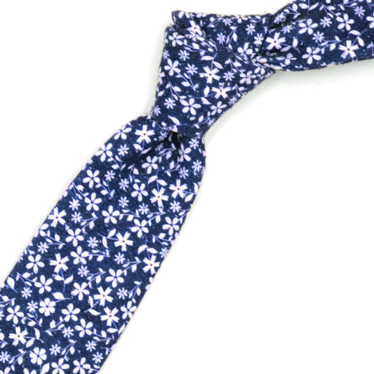 Blue tie with white flowers