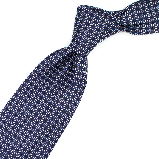 Cravatta blu con pattern geometrico bianco e azzurro