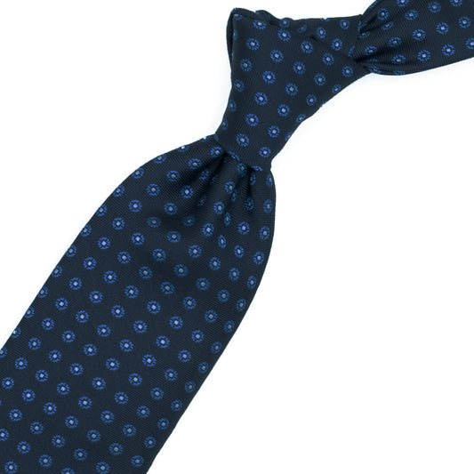 Cravatta blu con fiorellini bluette e quadratini azzurri