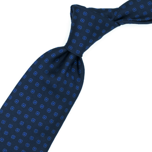 Cravatta blu con fiorellini blu e quadratini bluette