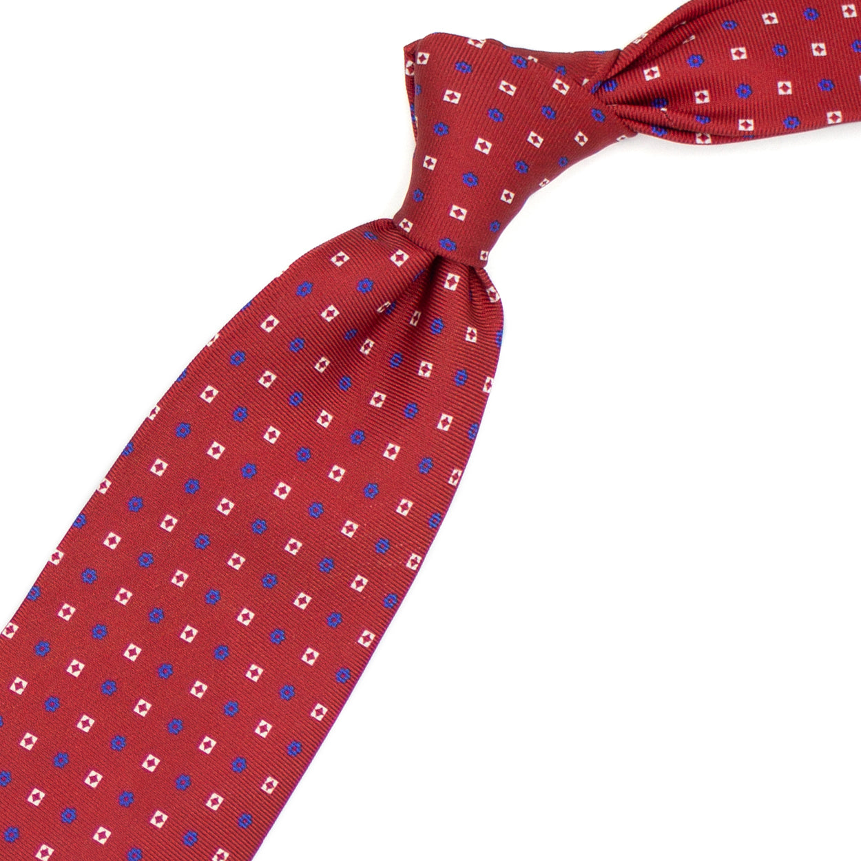 Cravatta rossa con quadratini bianchi e fiorellini blu