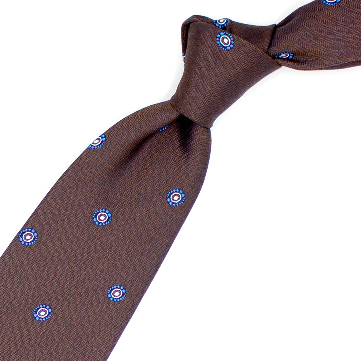 Brown tie with blue and white design