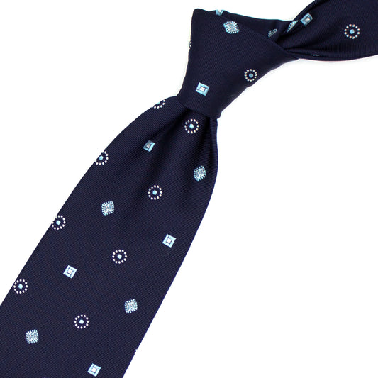 Cravatta blu con pattern geometrico grigio e azzurro