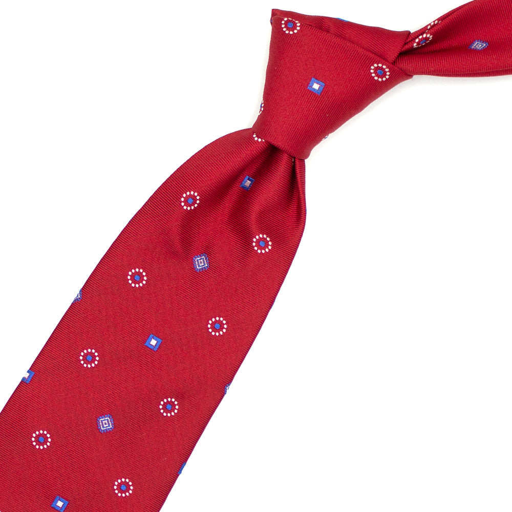 Cravatta rossa con pattern geometrico azzurro e bianco