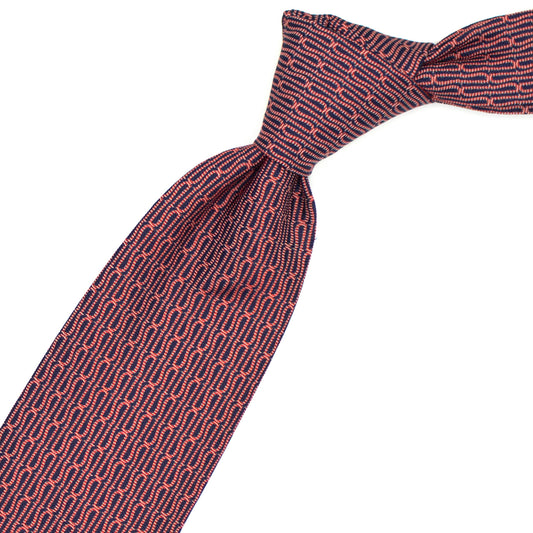Cravatta blu con pattern Ulturale rosso