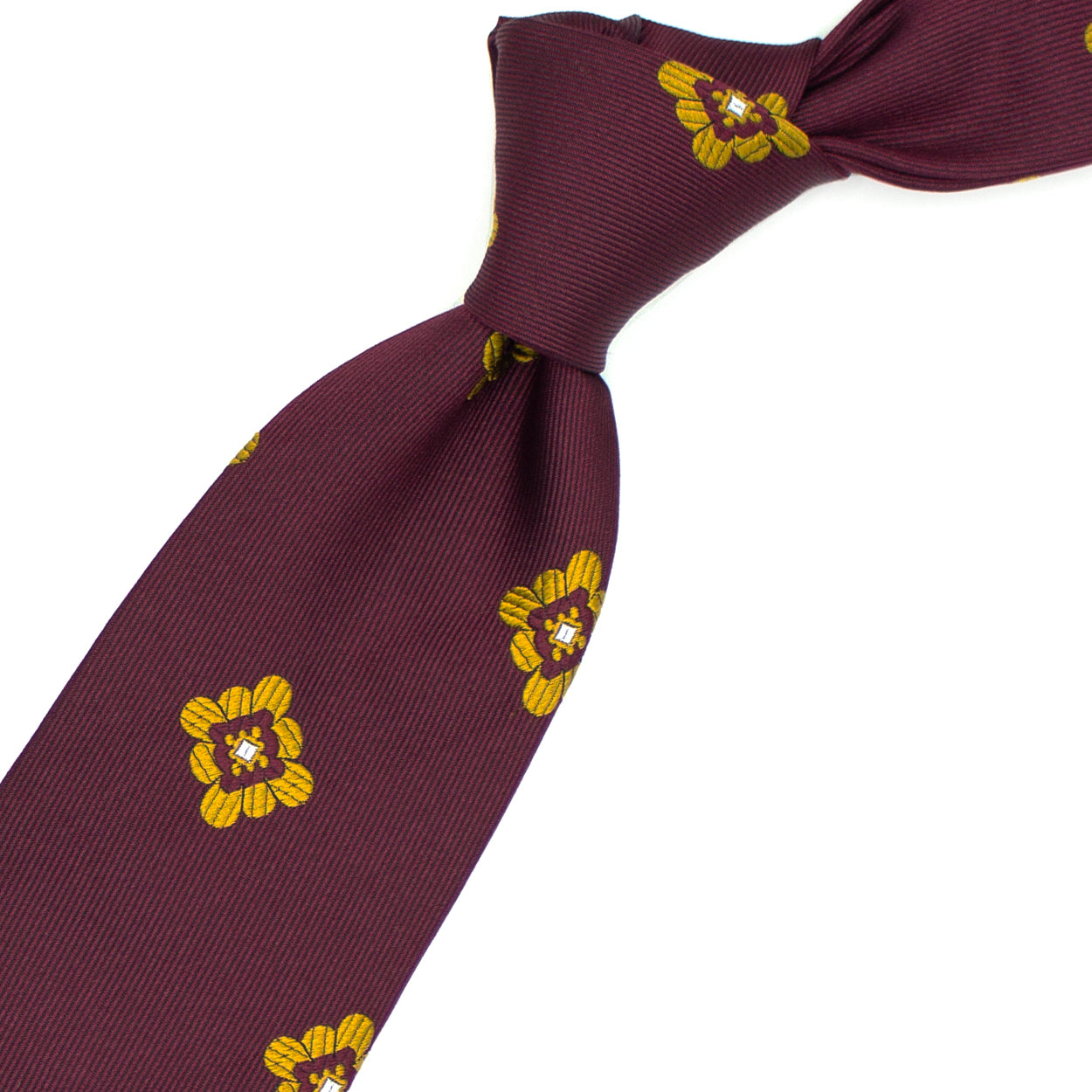 Cravatta bordeaux con fiori dorati