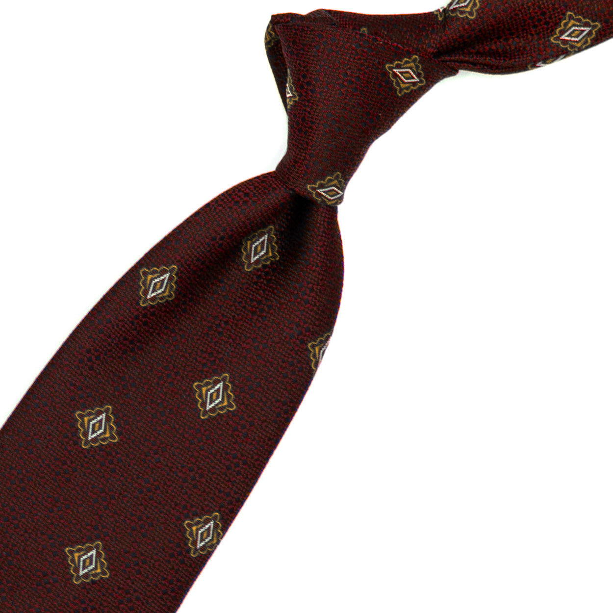 Cravatta bordeaux con pattern geometrico dorato e bianco
