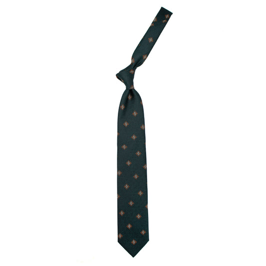 Cravatta verde con pattern geometrico arancione e bianco