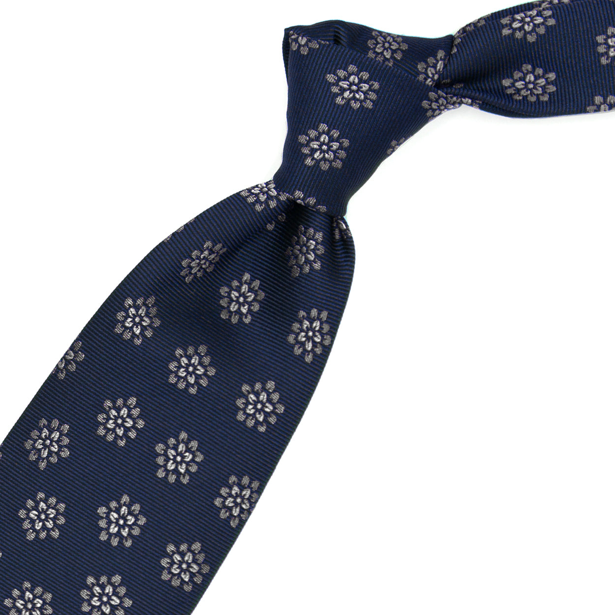 Cravatta blu con fiori grigi