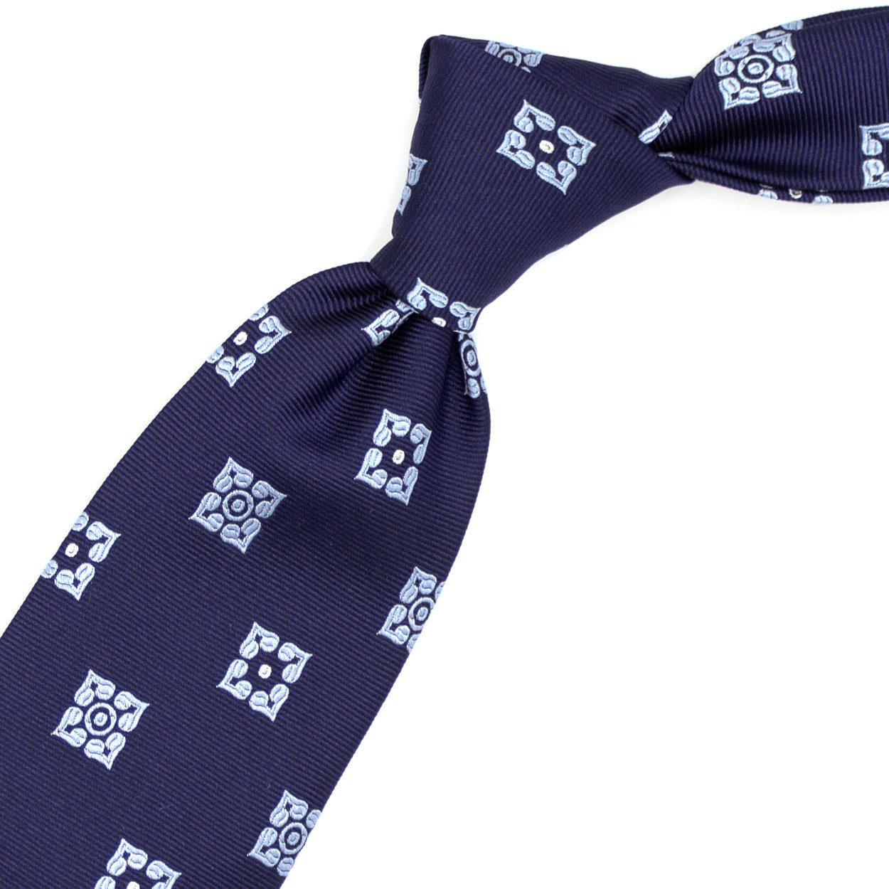 Cravatta blu con fiori azzurri