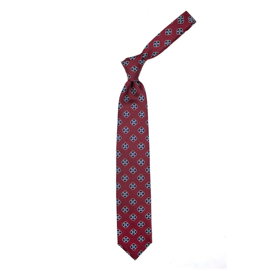 Cravatta rossa con pattern geometrico blu, azzurro e grigio