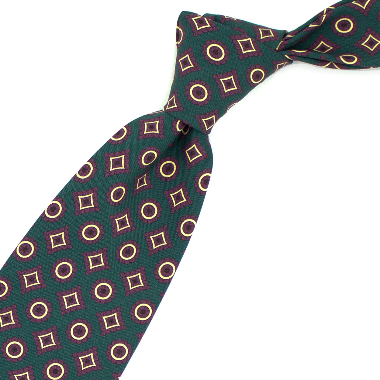 Green tie with burgundy and cream geometric pattern