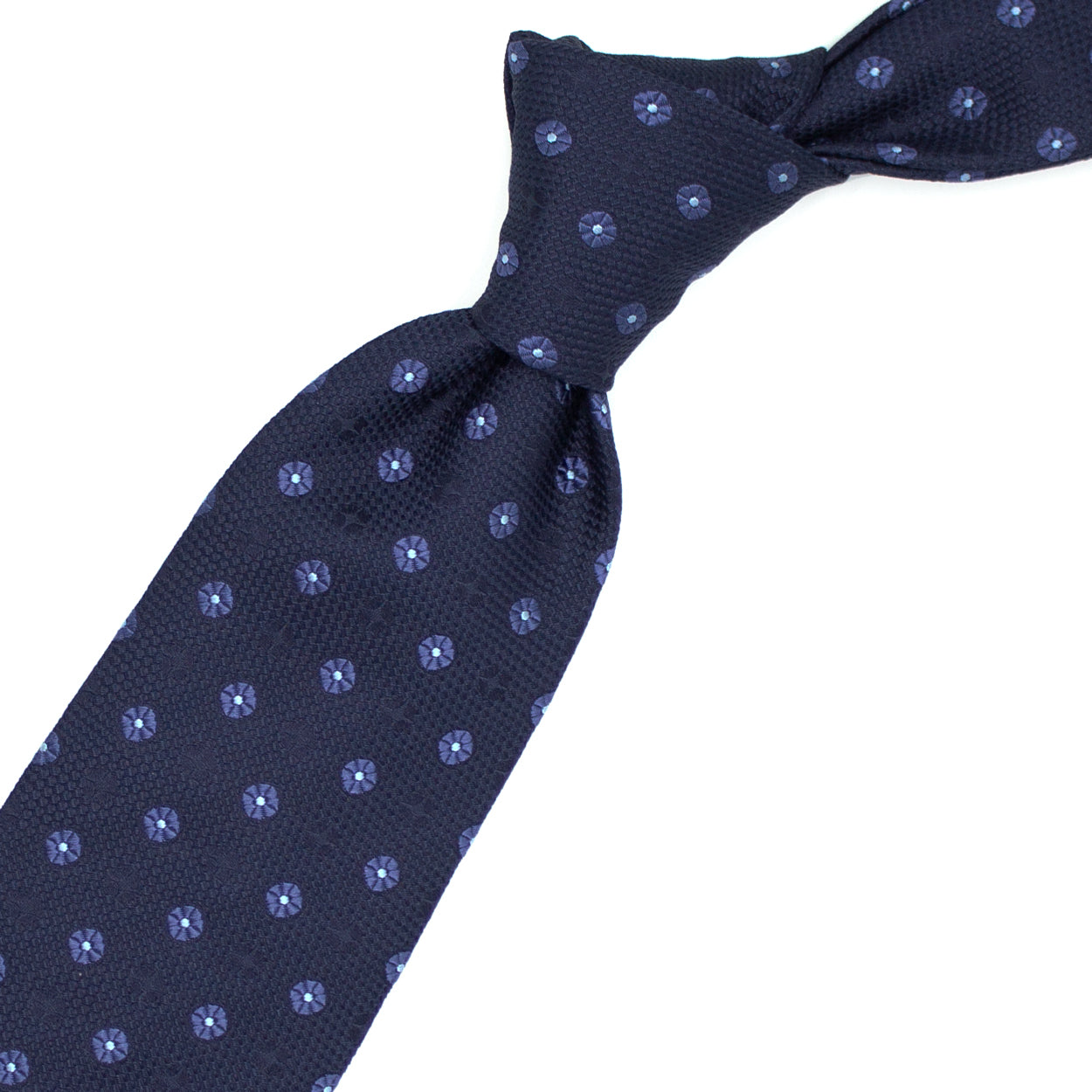 Cravatta blu con fiori azzurri e tono su tono