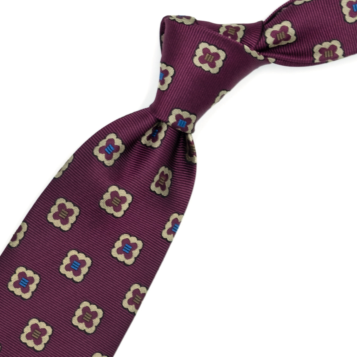 Cravatta vinaccia con fiori dorati e quadrati bluette