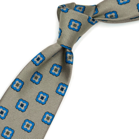 Cravatta beige con fiori bluette e quadrati marroni
