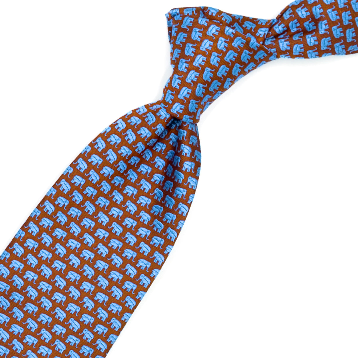 Cravatta arancione con elefantini azzurri