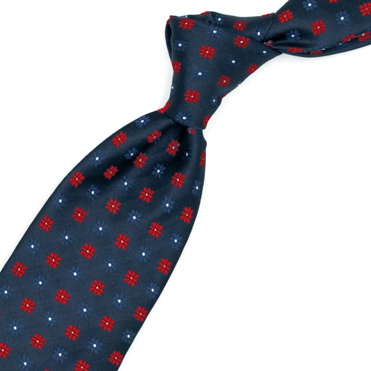 Cravatta blu con fiori rossi e tono su tono