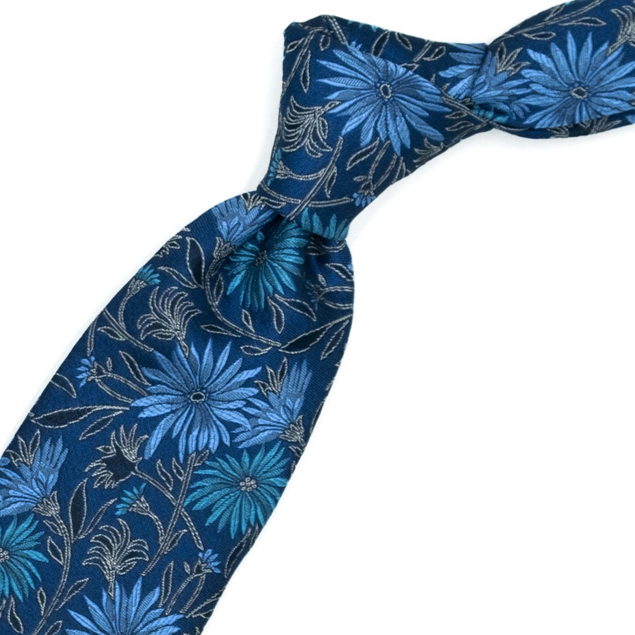 Cravatta blu con fantasia floreale azzurra e grigia