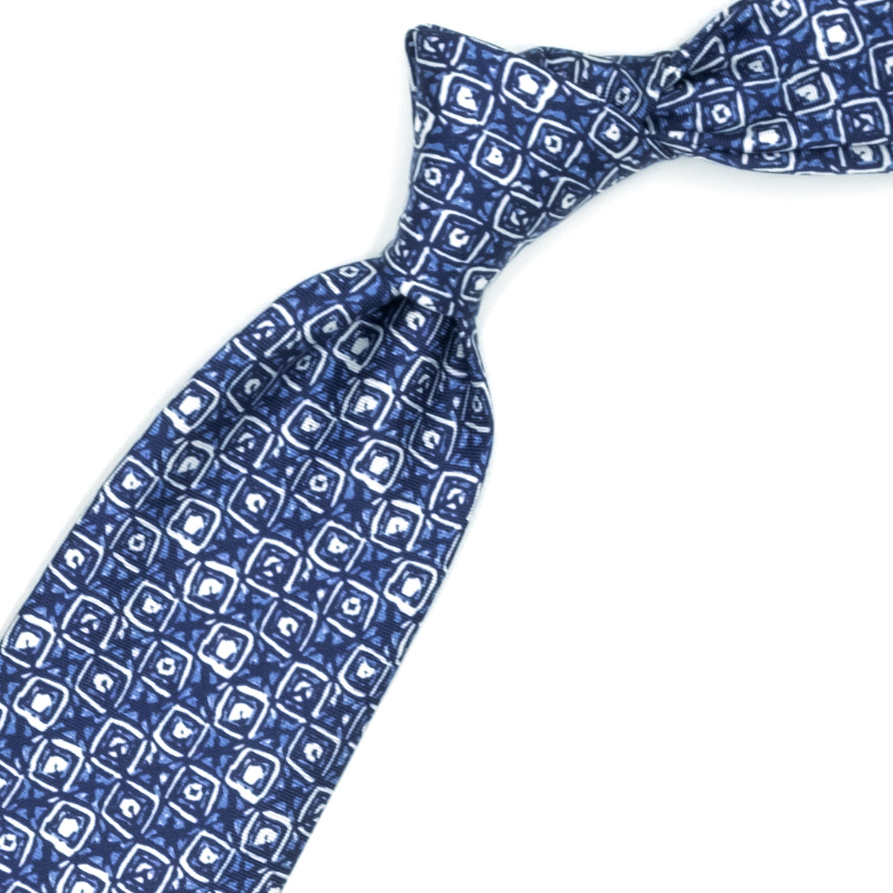 Cravatta azzurra con pattern astratto bianco e blu