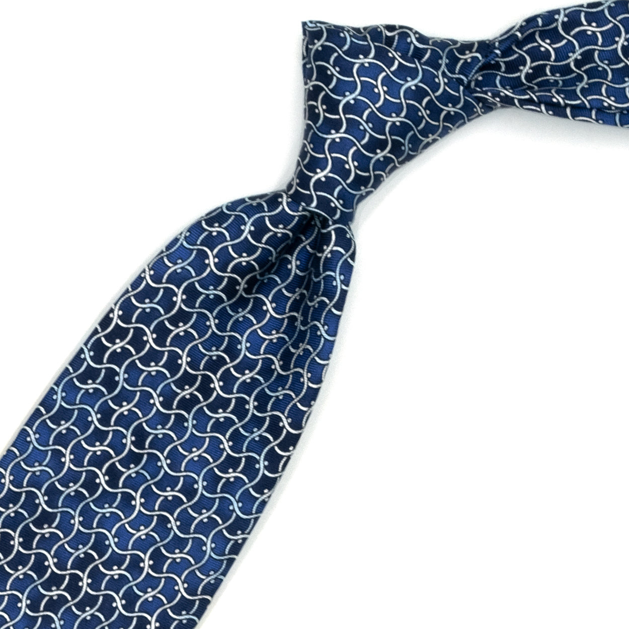 Cravatta blu con pattern astratto bianco