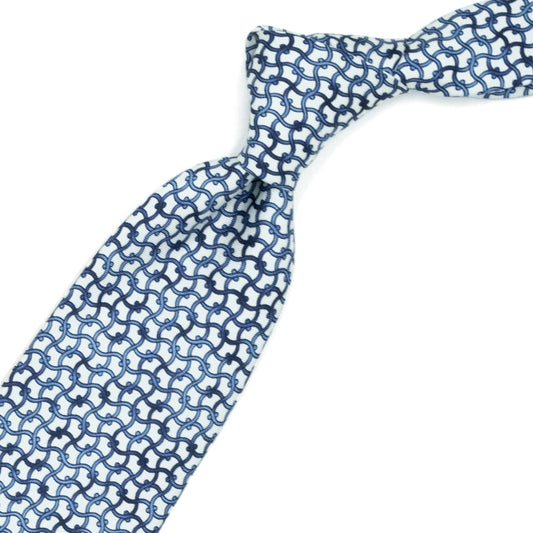Cravatta bianca con pattern astratto azzurro e blu