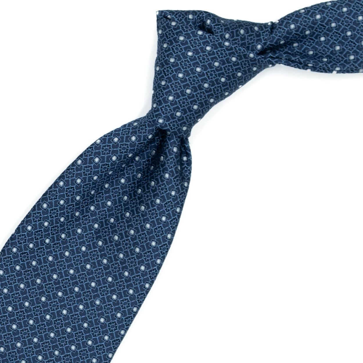 Cravatta blu con fiori tono su tono e pallini bianchi
