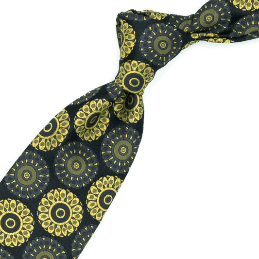 Cravatta nera con medaglioni gialli