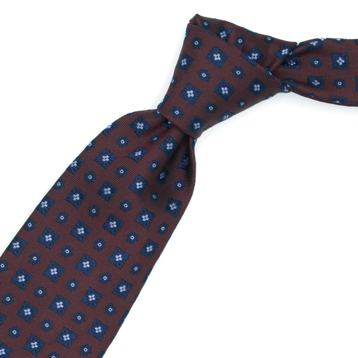 Cravatta bordeaux con fiori blu e azzurri