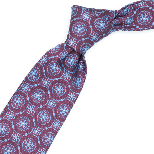 Cravatta magenta con fiori azzurri