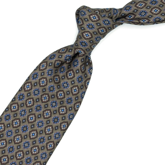 Cravatta beige con medaglioni
