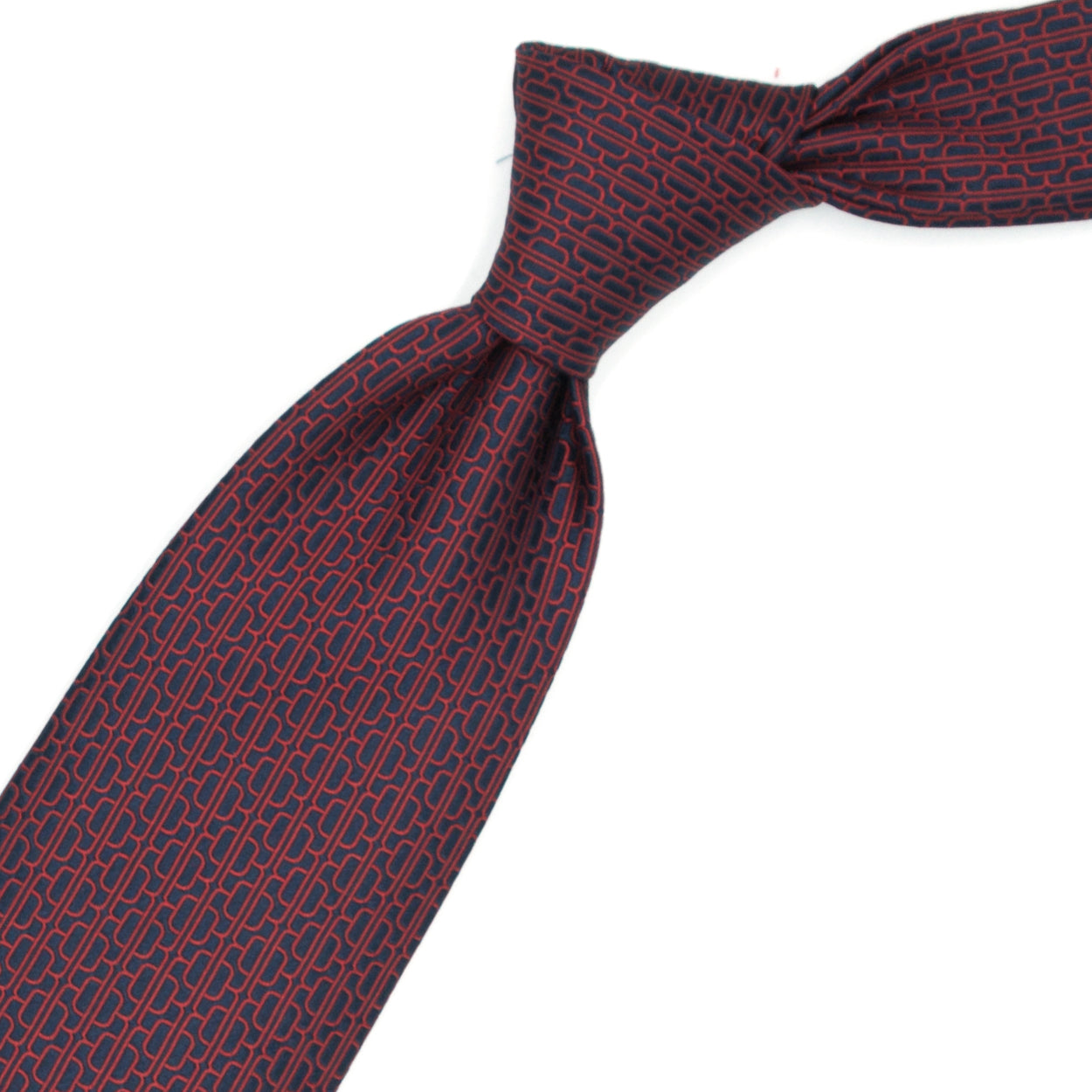 Cravatta blu con pattern astratto rosso