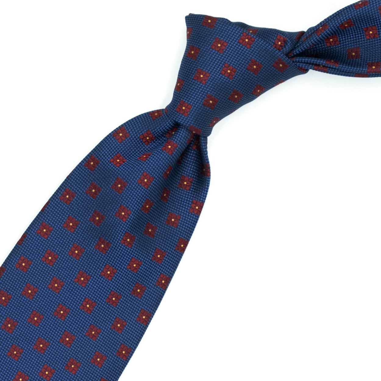 Cravatta blu con fiori rossi