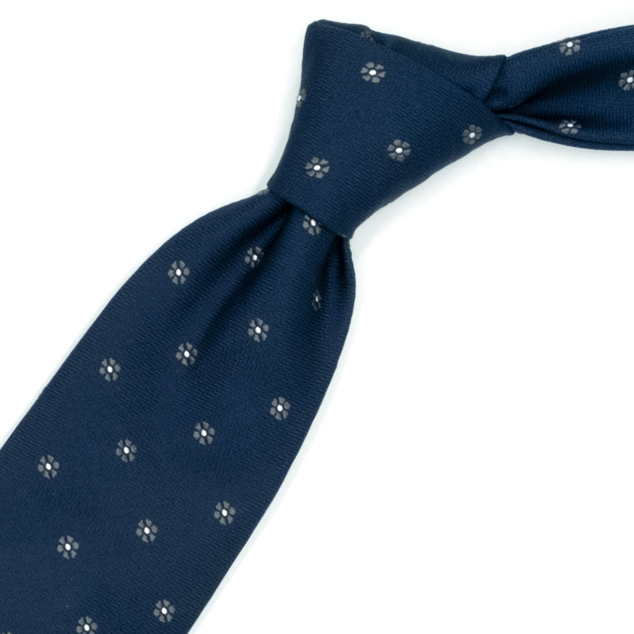 Cravatta blu con fiori grigi